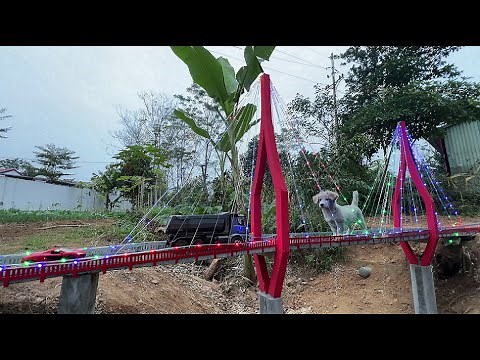 Construction of a mini cable-stayed bridge over land
