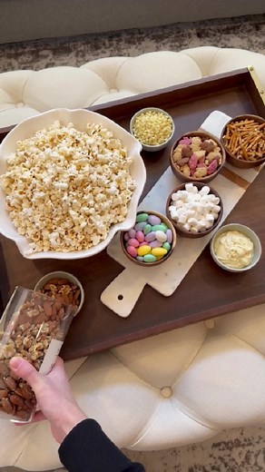 A little movie night foodie ASMR 🥰🍿This is so fun to do with popcorn and your favorite toppings! #movienight #foodie #foodinspiration #snackideas | The Magnolia Mercantile