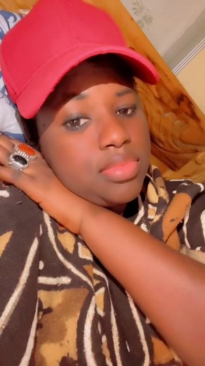 Exploring Fashion with a Red Cap and Patterned Garment