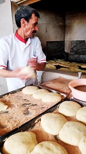 6K views · 23 reactions | Amazing ancient bread making in the oven right now 稜 #foodie #breadmaking #artisanbaking #bakingprocess #tandoor #freshbread | This Bakery I | Facebook