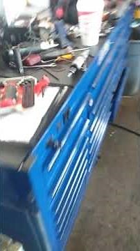 How to remove a 2013 Tesla Model S P85 lower control arm