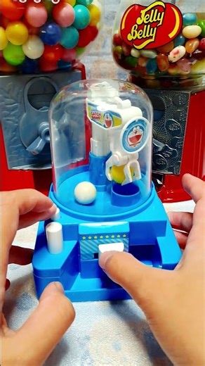 satisfying with this mini claw machine 🟣🟠🟡