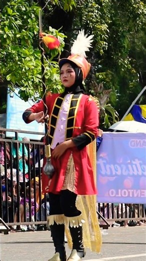 Beautiful Majorette Leading the Marching Band