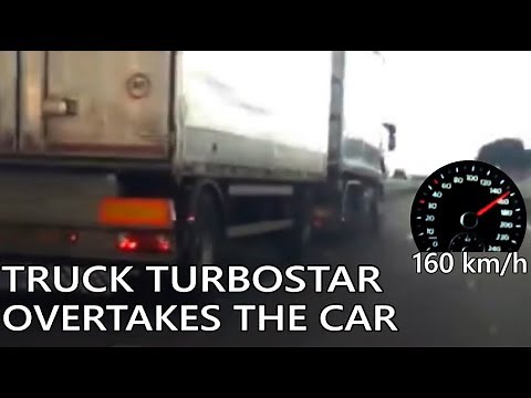 Old Iveco Turbostar truck performs overtaking manoeuvre on motorway