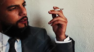 Businessman Smoking - This is the perfect footage to show or illustrate businessman smocking at work, having a break downstairs close to the office, Having your first cigarette Close up - 4K