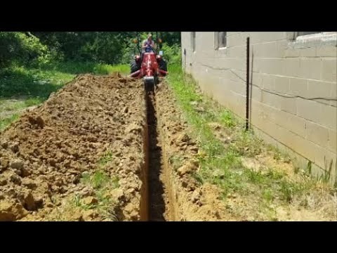Digging Water Line Trench with Backhoe.