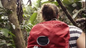 woman hiking in jungle