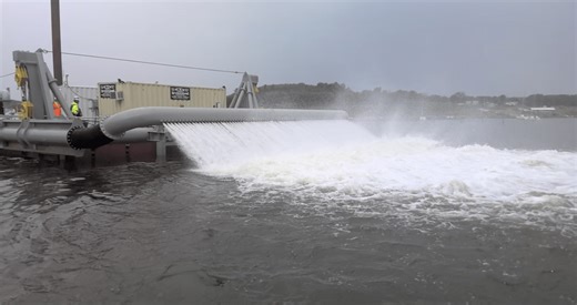 Engineers work to save one of the largest lakes in Kansas from rising mud