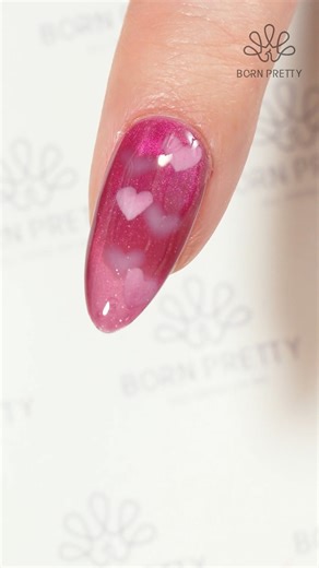BORN PRETTY Official on Instagram: "Pink love pulsing on my nails! 💓✨ Using #bornpretty 🍬6 Colors Glass Cat Magnetic Gel M39 Strawberry Bear HEMA/TPO FREE: MY410 (62959) ✨Super Top Coat（ID：58775） Tap the link in my bio or visit bornpretty.com to get same nail🛒 #valentinenails #pinknails #heartnails #cateyenails #sparklingnails #diynails #winternails #nailart #reflective #nailsdesign #nailgel #allshinonme #naillover #gelnails #nailinspo #nailtips"
