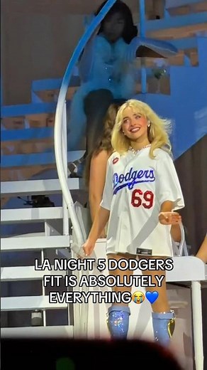 notice what’s hanging on her boots 👀