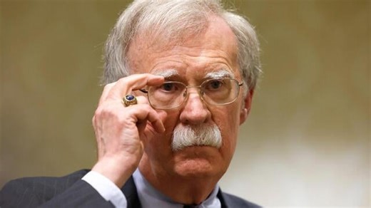 What are the charges against John Bolton?