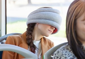 Ostrich Pillow Light Lets You Grab A Nap While Travelling (video)