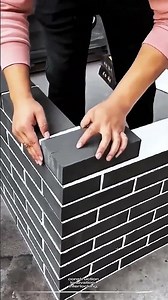 Interlocking mortarless bricks enable fast wall building with perfect alignment and no cement