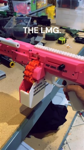 Frontline Foam on Instagram: "The MHP LMG is one of our coolest blasters, we LOVE full-auto action! This beast brings next-level nerf warfare to your arsenal – high-capacity, full-auto, belt-fed madness. Whether you're storming the backyard or owning the battlefield, the MHP LMG brings serious firepower. Get yours today at the link: https://shorturl.at/cTN9L #mhplmg #fullauto #3Dprinting #nerfblasters #nerfcommunity #nerfwarfare #links #customizable #fun #assembly #flf #fyp #satisfying #asmr"