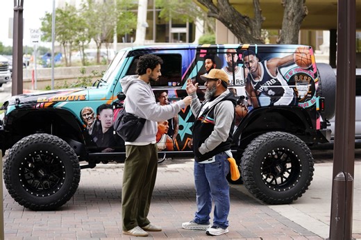 Spurs fans show their love with car wraps, flags and honking