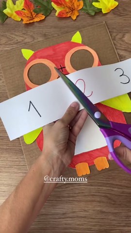 Stephanie & Katrina | Crafty Moms on Instagram: "ADDITION MATH BOARD 🦉🍁 We know how hard it can be for our kids to practice math, so learning through play is our preferred method and we love to find creative ways of doing it. We love fall activities so this time we reused our cardboard box to make a fun math board. Our oldest uses it to practice additions and the little ones love to use it to recognize numbers. Little do they know they are learning so much with this engaging and cute activity.