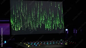 Matrix code rain on laptop screen in dark modern room. Background of falling green digits. Binary data, decryption, encoding. Cyber tech secure. Algorithm, coding, hacking. Technology, data encryption