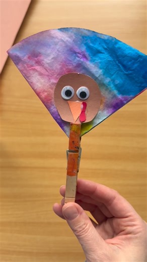 Kim, OTR/L on Instagram: "Coffee Filter Turkey SUPPLIES: -coffee filter -dot markers -spray bottle (filled with water) -clothes pin -construction paper & googly eyes (for turkey’s face) HOW TO: -stamp dot markers on coffee filter -spray filter with water so the colors blend together -let dry! -fold the filter into quarters, add a turkey face, then clip the clothespin to the bottom GROWN UPS: -Always supervise children during activities. Caregivers are responsible for ensuring safety of the child
