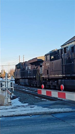 Norfolk and Southern Diesel Train at Railroad Crossing