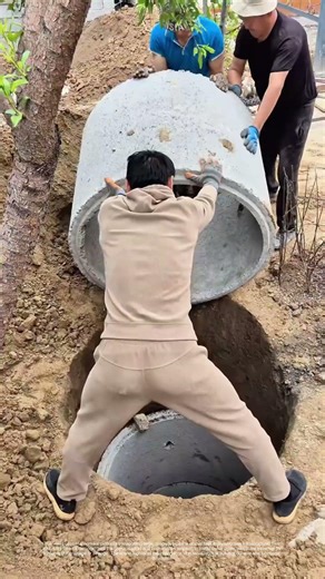 Hauling Heavy: How Workers Move Concrete Pipes to Build Infrastructure