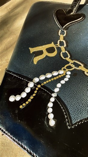 Um OKAY 👀 Check out this latest commission! Leveled up on a beautiful, timeless Christian Lacroix bag #painted #paintedbag #artistoninstagram #bagcharm #christianlacroix | Rachel Dove Liberati