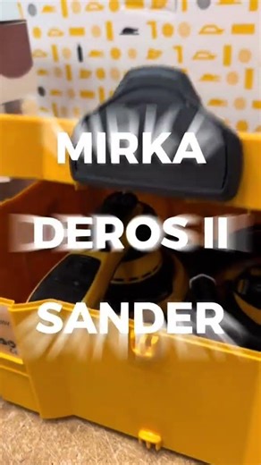 A compact and easy-to-use electric orbital sander, designed for efficient sanding of large surfaces.