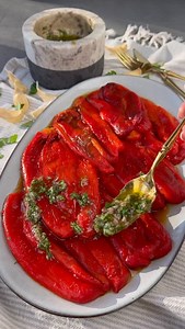 Roasted Red Peppers with Garlic Parsley Dressing- have been loving these peppers ever since I can remember my childhood and for a good reason. I remember summertime my family will fire roast a tons of peppers and freeze them in plastic bags so we have plenty for the winter months- such sweet memories! Ingredients: 7 red peppers Dill, for garnish Garlic- parsley dressing: 3 garlic cloves 1/4 cup olive oil 2 tbs red wine vinegar 1 1/2 tsp salt 1/4 tsp black pepper 2 tbs parsley, chopped Method: 1.