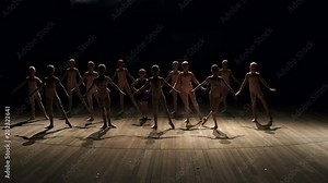 A large group of children rehearsing and dancing the ballet. A choreographed dance of a group of graceful pretty young ballerinas practicing on stage in a classical ballet school. Slow motion. Stock Video