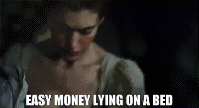 Easy money Lying on a bed
