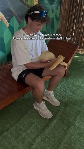 A Travel Creating petting Snakes in BALI