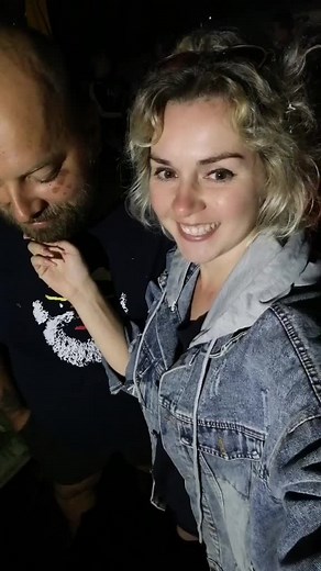 Casual Night Conversation: Man and Woman in Denim