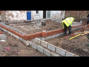 Bricklaying up to damp course, in Knutsford Cheshire