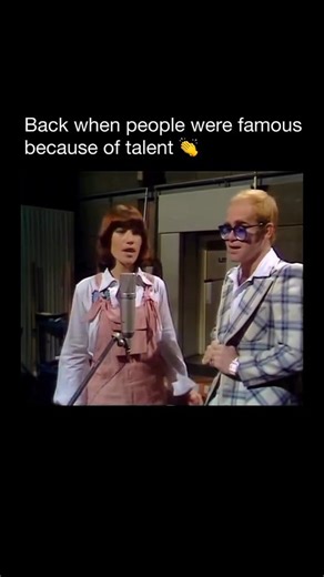 hidden inside history on Instagram: "Released in 1976, "Don’t Go Breaking My Heart" was Elton John’s affectionate tribute to the classic Motown duets of the 1960s. Written by Elton and Bernie Taupin under the aliases Ann Orson and Carte Blanche, the track was never intended to be a serious ballad—it was designed for pure, infectious fun. follow @hiddeninsidehistory for more The magic of the song came from the natural chemistry between Elton John and Kiki Dee. Remarkably, the two singers recorded