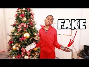 I Bought Him A Fake iPhone XS Max For Christmas **PRANK!** ($1,000)