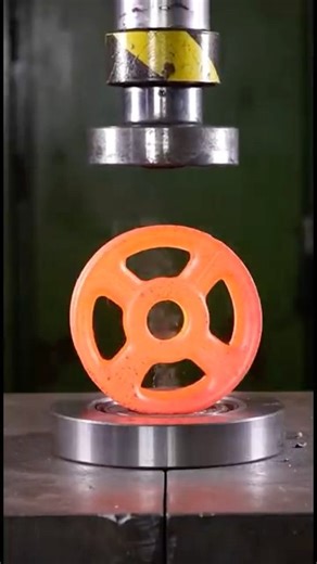 Crushing a Hot Steel Rim with a Hydraulic Press