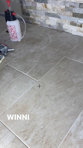 Drilling the hole for free standing tub drain #diy #work #realestate #homeimprovement #homerenovation #construction #plumbing #tutorial #hardwork #tile | WINNI
