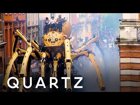 Giant spider and minotaur robot puppets on the streets of France