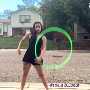 154K views · 1.3K reactions | She's absolutely mesmerizing with the hula hoop! (via Melina Bear Performance Art) | Distractify | Facebook