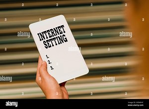 Hand writing sign Internet Setting. Business concept etermines how it connects to your wireless carrier for data Voice And Video Calling Capabilities Stock Photo - Alamy