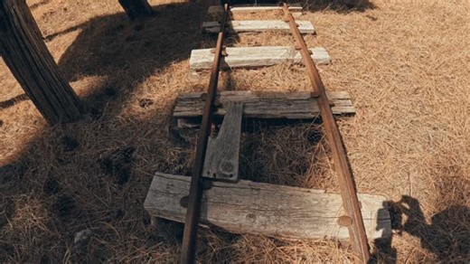 Some cinematic Black Hills history! This gold and silver mine dates back to the late 1800s. This mining operation was recorded as a prospect, and it did not go more than 600 feet below the surface. However, it did belong to a larger mining company in the Southern Black Hills who had more successful mines nearby. This was more of an exploratory shaft. As you see in the video, the old wooden headframe is still standing tall and proud over the mine workings below! The landowner told us that when he