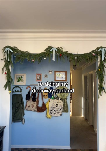 do not hurt my feelings and tell me you liked it better before plsss I’ve been looking at it for the past month, thinking it just didn’t look right (damaged paint aside) but I’m glad I did it because I like it 1000x more #christmastree #christmasdecor #tensionrodgarland #doorwaygarland #christmasgarland