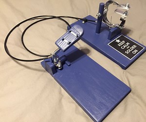 Foot Activated Opposable Thumb Third Hand Clamping Device