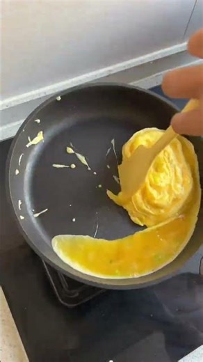 Rolling eggs into a perfect shape.#eggroll #foodprocess #kitchenwork #satisfyingvideo #fyp #shorts