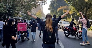 Women and girls are leading Iran protests, but others are joining from across society