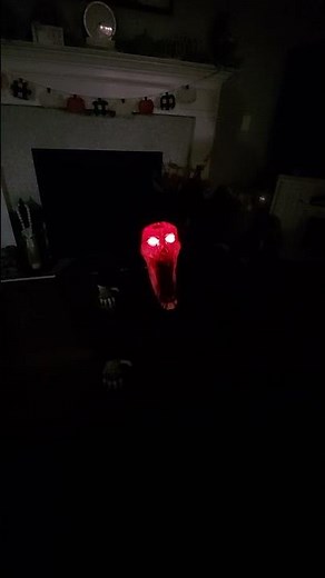 Spirit Halloween 2024 model Nightcrawler animatronic in the dark
