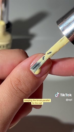 Back to basics 🤓 @Elizabeth shows how to get a seamless nail polish application every time 💅 ft. summer must-have This Chic Is Bananas. 🍌 #OPI #OPIInfiniteShine #yellownails #diynails #nailtips