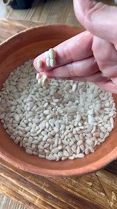 Cheesy refried bean dip made with creamy white beans, jalapeño, bacon, and melty cheese. Easy, economical, and perfect for dipping, spreading, or scooping. | Muy Bueno Cookbook