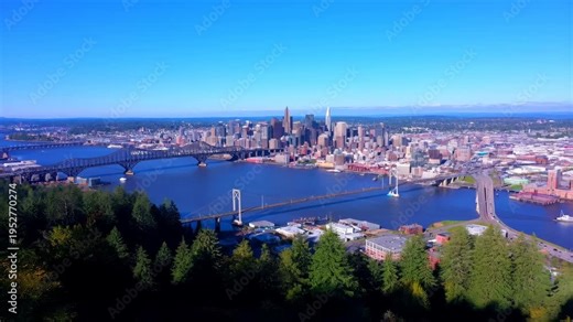 Cityscape downtown Portland with waterfront and bridges, aerial view featuring river, bridge, urban with landscape and city elements for