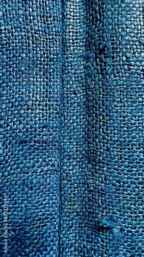 Hemp fabric is made from fibers of the cannabis plant stem. Known for its durability and strength, hemp is an eco-friendly textile with various applications. The texture of hemp fabric is typically