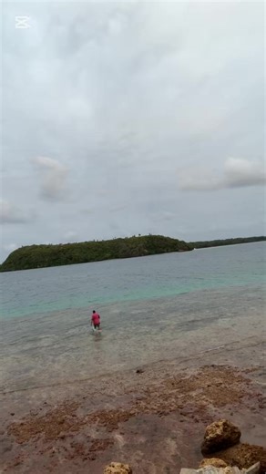 Discovering Unique Sea Shells After a Refreshing Swim